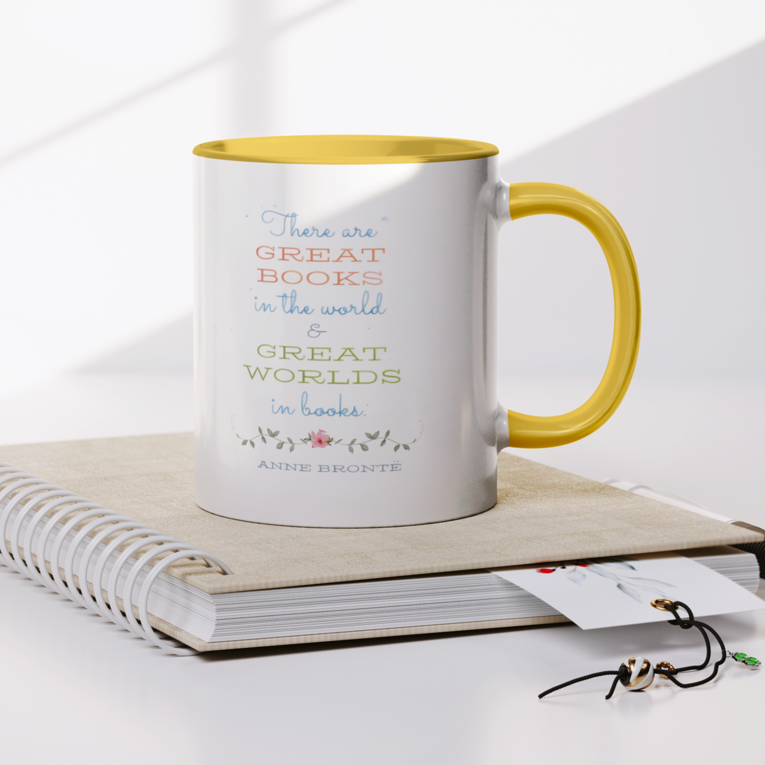 Bronte_Sisters_11oz_Yellow_Accent_Mug_Notebook_Mockup.png
