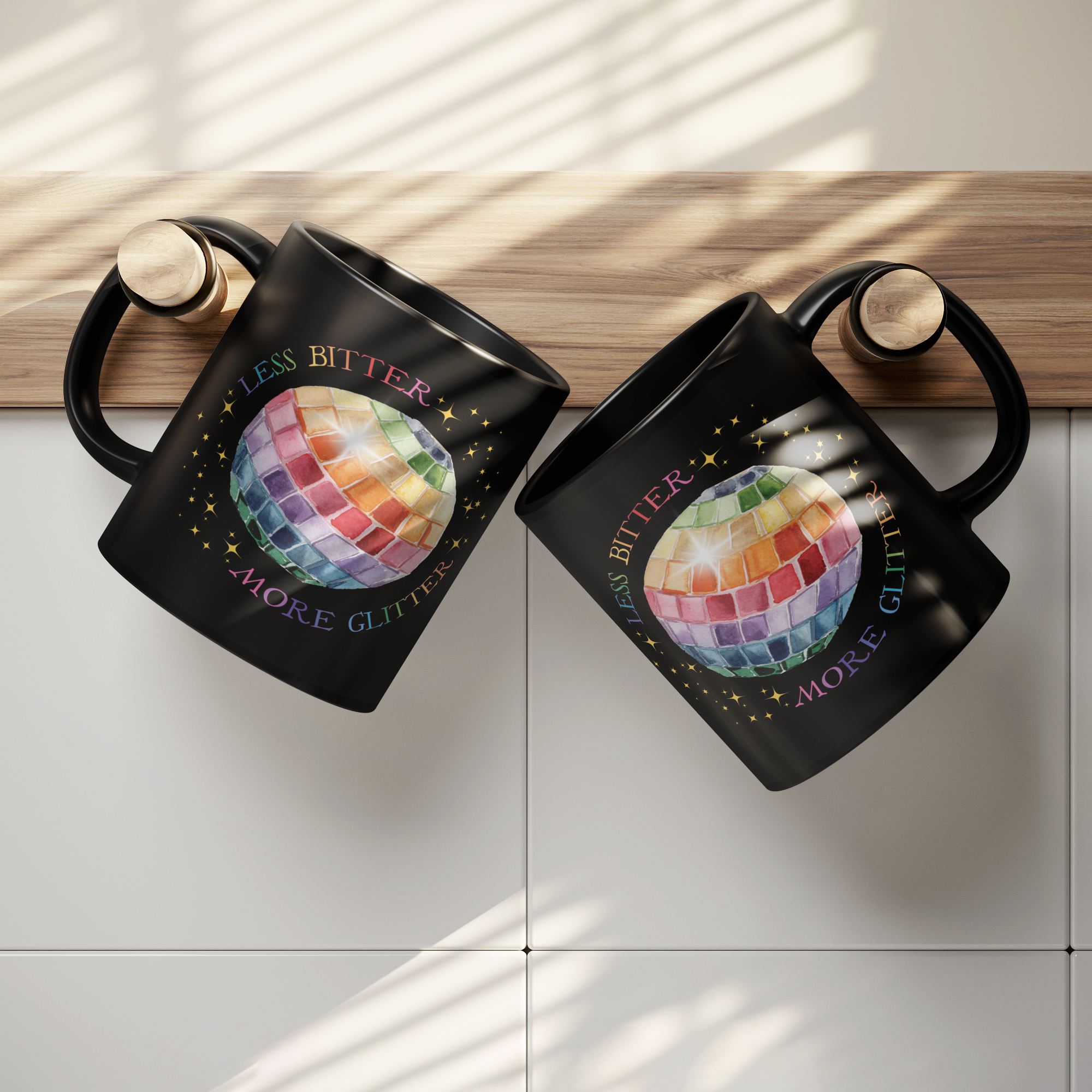 Less_Bitter_More_Glitter_Black_11oz_Mug_Lifestyle_Hanging_Mugs_Mockup.png
