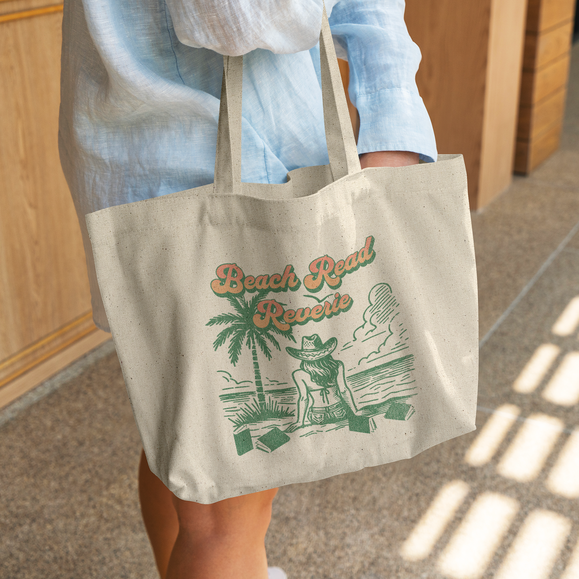Beach_Read_Reverie_Canvas_Tote_CottonTote_L_WomanDigging_Mockup.png