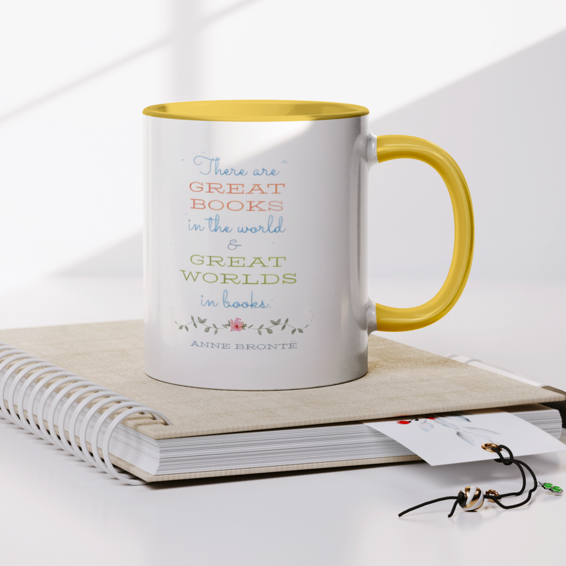 Bronte_Sisters_11oz_Yellow_Accent_Mug_Notebook_Mockup.png