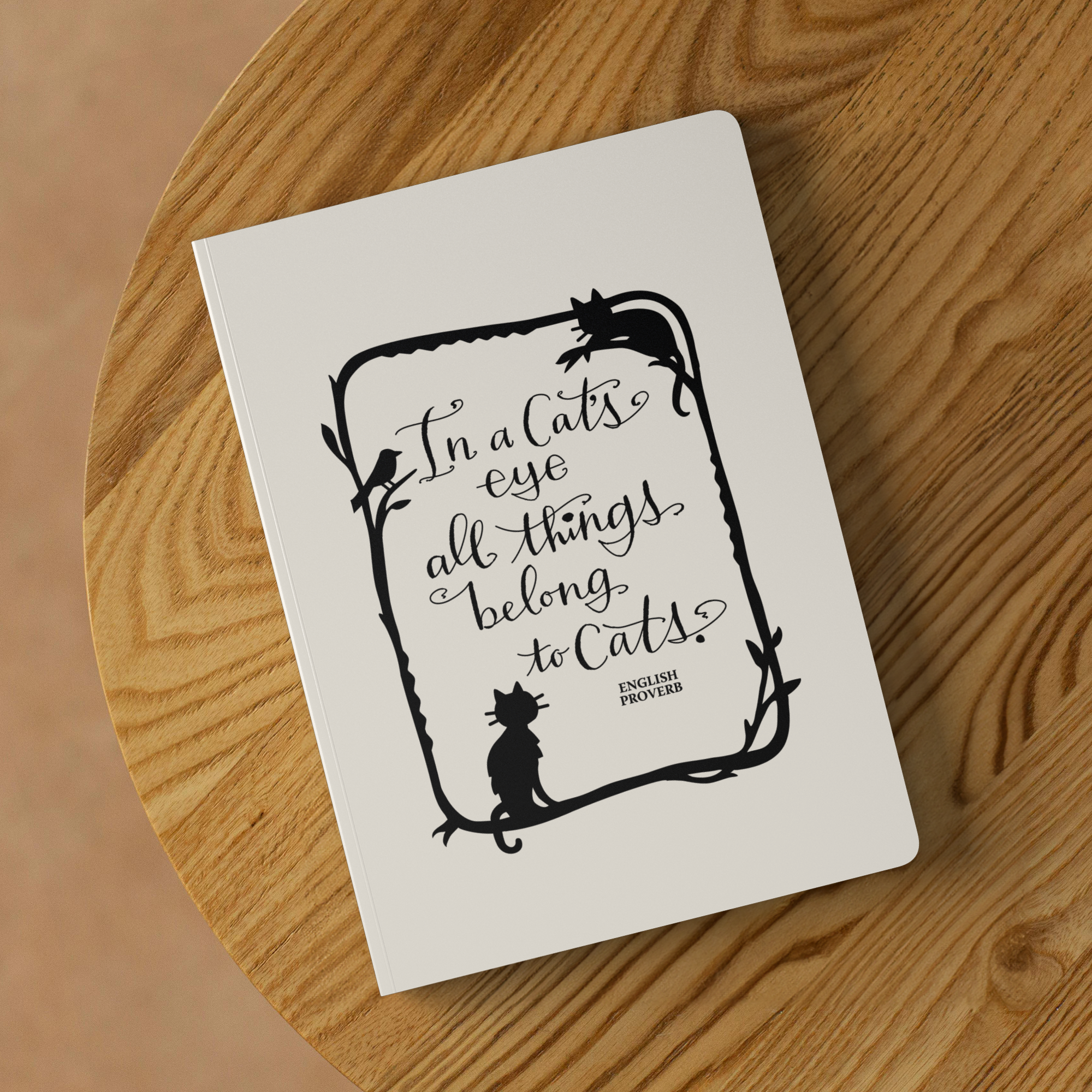 In_a_Cats_Eye_Softcover_Notebook_Lifestyle_2_Mockup.png