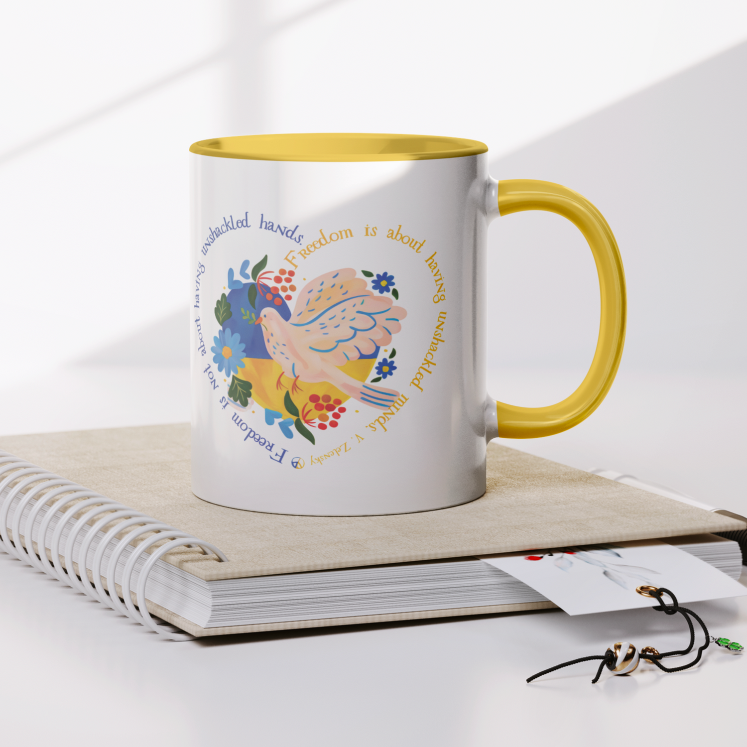 Slava_Ukraini_Mug_All_Profits_Donated_t_Notebook_Mockup.png