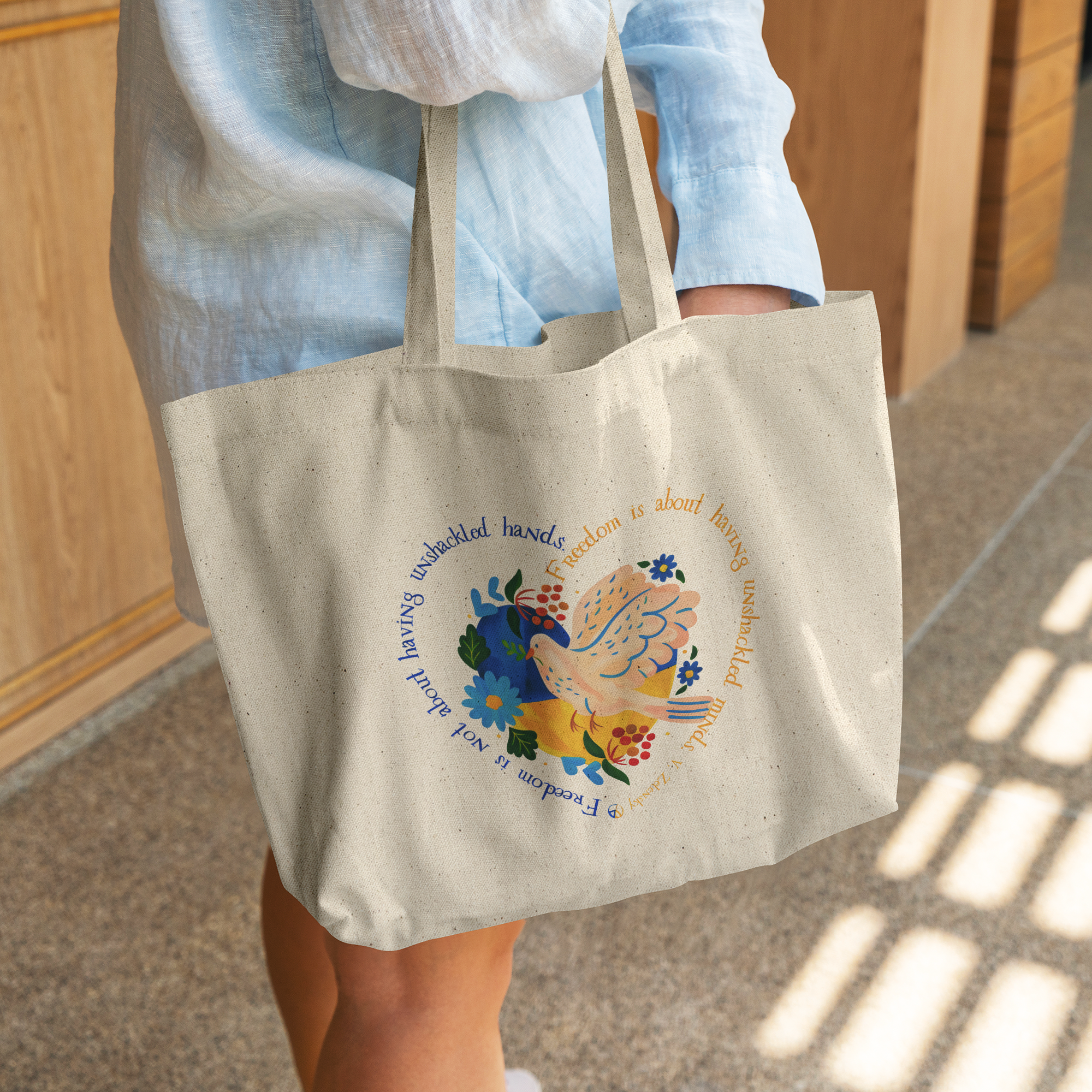 Slava_Ukraini_Oversized_Tote_All_Profit_CottonTote_L_WomanDigging_Mockup.png